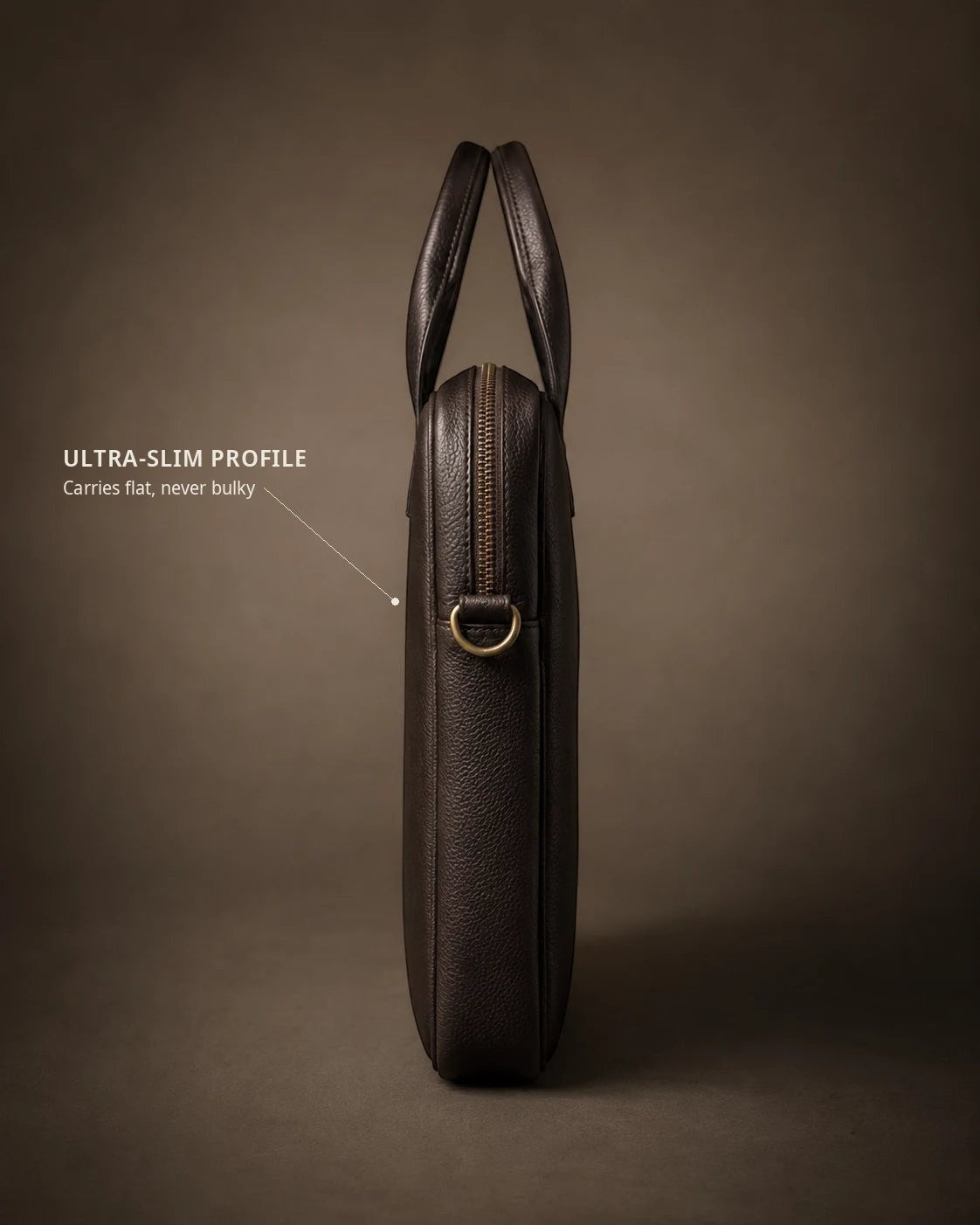 Wildebeast The Wayfarer dark brown pebbled leather work bag shown from a slim side profile view.