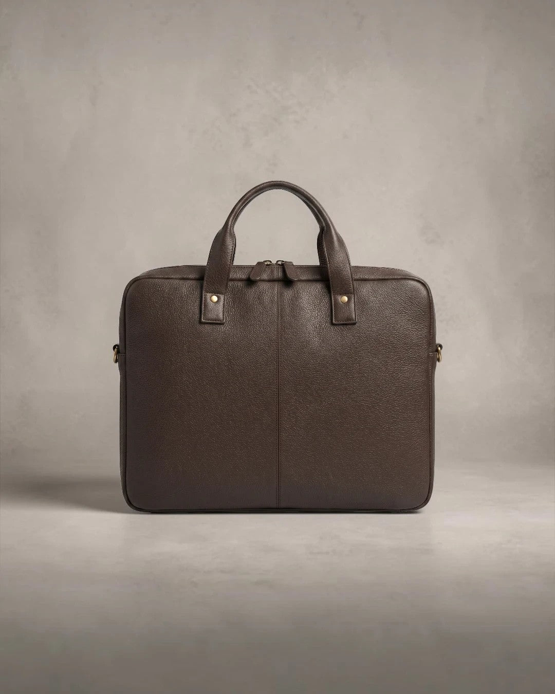 Wildebeast The Wayfarer slim dark brown pebbled leather work bag with structured shape and antique metal hardware