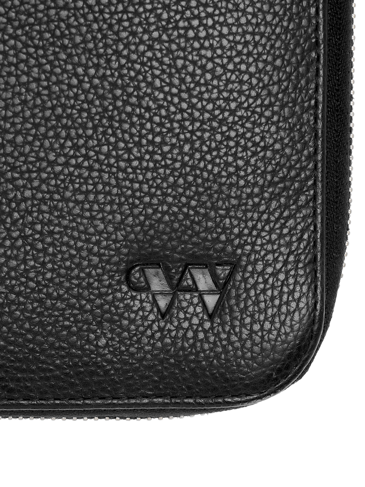 Close-up of the debossed Wildebeast logo on The Dock Tech Folio black pebbled leather