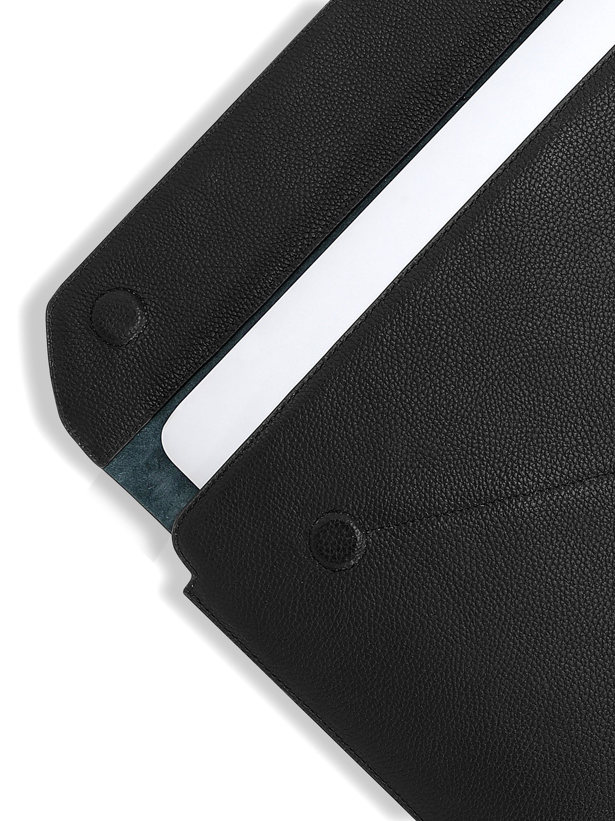 The Envoy black sleeve with the magnetic flap open and a laptop inside