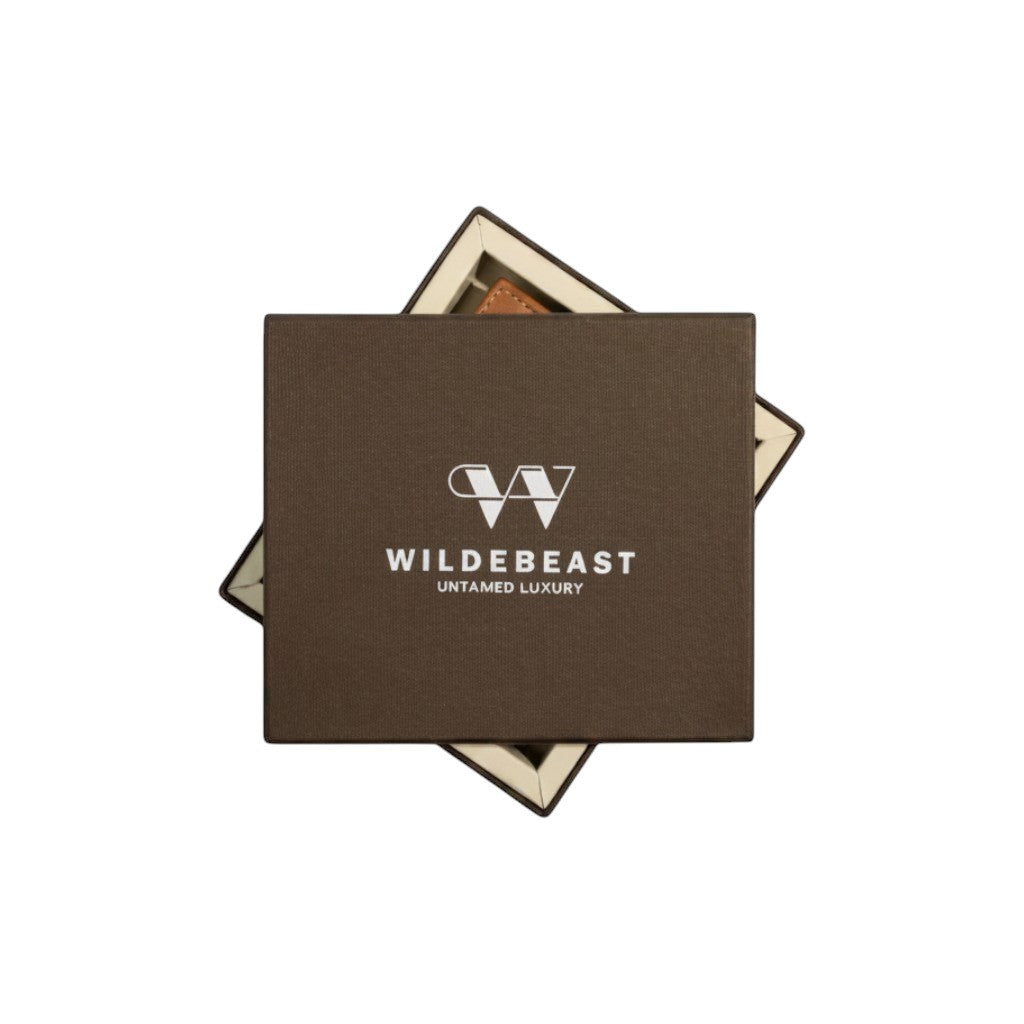 The Nomad Black leather wallet presented in its Wildebeast gift box