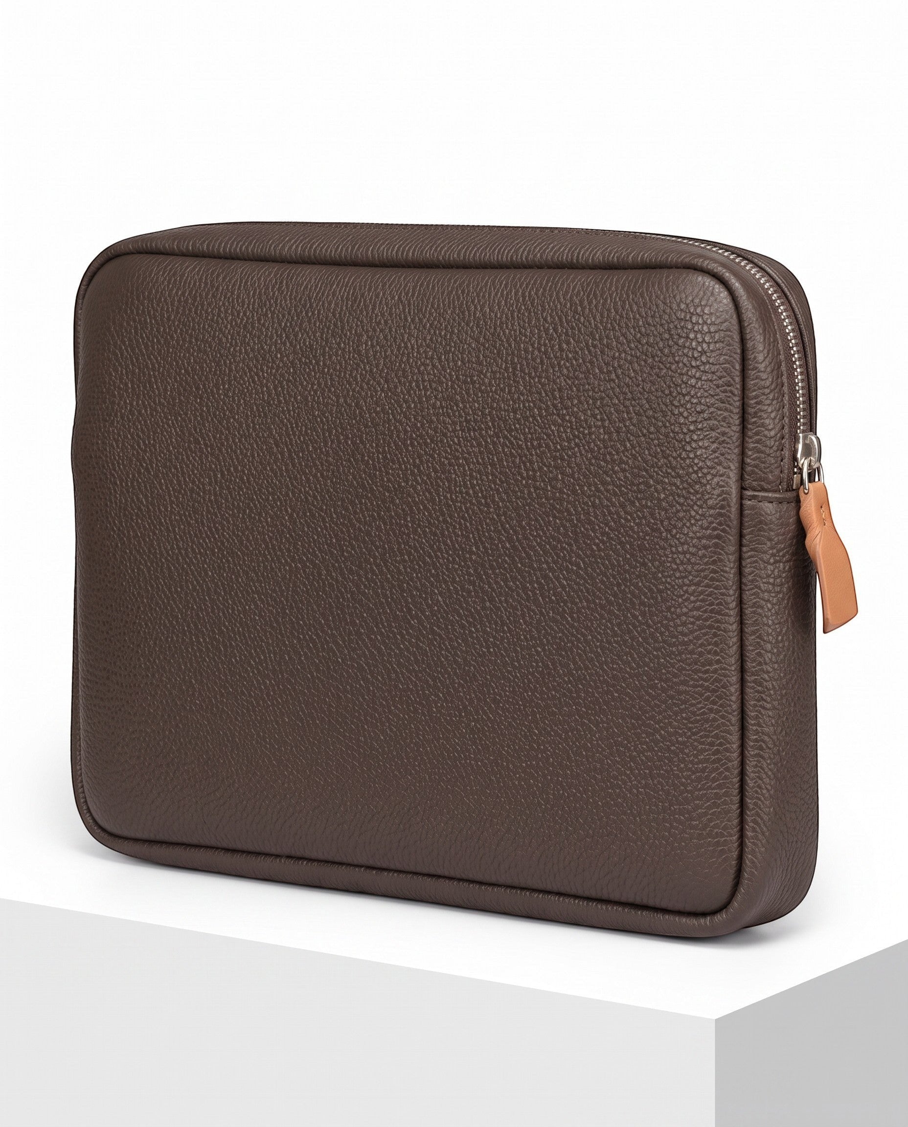 Wildebeast The Relay brown pebbled leather tech organiser pouch with a silver zip and tan leather pull tab.