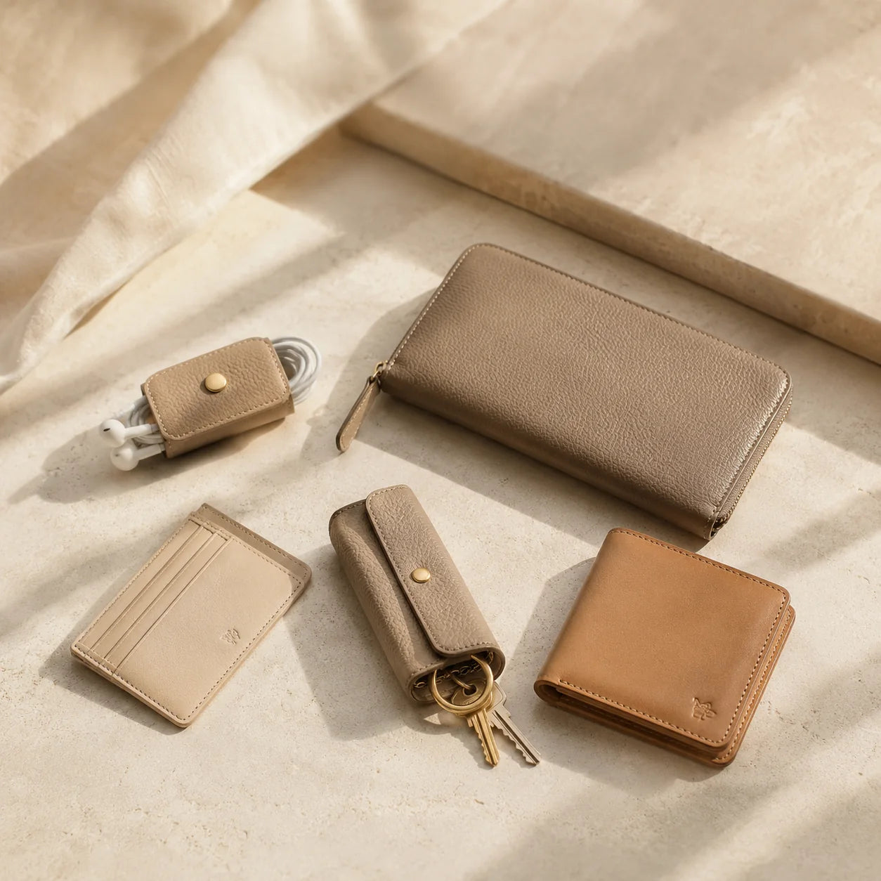 Finished leather wallets, key case and zip pouch